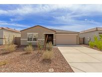 Charming single-story home with a neutral color scheme and a well-maintained front yard at 18449 E Eloisa Dr, Gold Canyon, AZ 85118