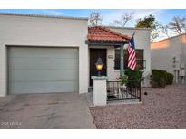 Charming single-story home with a garage and landscaped front yard at 4328 E Capri Ave # 171, Mesa, AZ 85206