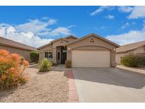 Charming single-story home featuring a neutral color palette, low-maintenance desert landscaping, and a spacious two-car garage at 8867 E Avenida Las Noches --, Gold Canyon, AZ 85118