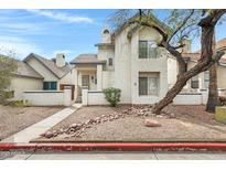 Charming two-story townhome with xeriscaped front yard at 1535 N Horne St # 15, Mesa, AZ 85203