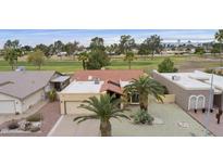 Charming single-Gathering home with a tile roof and low-maintenance desert landscaping in a golf course community at 9576 E Fairway Blvd, Sun Lakes, AZ 85248