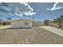 Charming single-story home featuring a low-maintenance desert landscape at 6851 E Windsor Ave, Scottsdale, AZ 85257