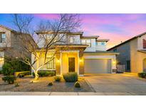 Charming two-story home with stone accents, well-maintained landscaping, and a spacious two-car garage at 17505 N 96Th Way, Scottsdale, AZ 85255