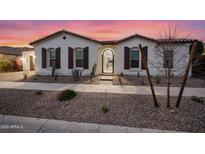 Charming single-story home with desert landscaping and wrought iron gate at 5340 S Sabrina --, Mesa, AZ 85212