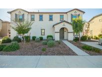 Charming two-story home with landscaped yard and inviting entryway at 4110 S 58Th Ln, Phoenix, AZ 85043