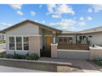 Charming single-story home featuring a well-manicured front yard and inviting curb appeal at 20718 W Colter St, Buckeye, AZ 85396