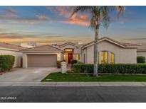 Charming home with a well-maintained yard and a neutral color palette at 7787 E Via Casta --, Scottsdale, AZ 85258