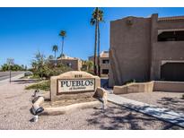 Welcome to 8155 Pueblos of Scottsdale, featuring desert landscaping and a clear blue sky at 8155 E Roosevelt St # 231, Scottsdale, AZ 85257