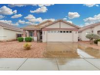 Charming single-story home featuring a tiled roof, spacious two-car garage, and low-maintenance desert landscaping at 4145 W Columbine Dr, Phoenix, AZ 85029