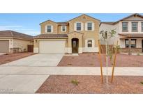 Two-story home with a two-car garage, neutral stucco, a tiled roof, and minimal desert landscaping in the front yard at 17264 W Via Dona Rd, Surprise, AZ 85387