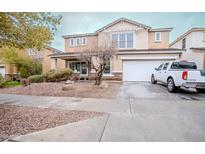 Charming two-story home featuring a well-manicured yard and a two-car garage at 4032 W Lydia Ln, Phoenix, AZ 85041