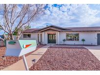 Charming home featuring a tidy, low-maintenance yard and classic desert landscaping at 6802 N 22Nd Pl, Phoenix, AZ 85016