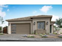 Charming single-story home featuring a neutral color palette and an attached two-car garage at 338 E Las Perlas Ln, San Tan Valley, AZ 85140