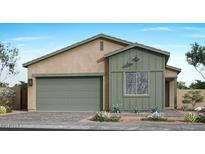 Charming single-story home with a two-car garage and well-maintained landscaping at 366 E Las Perlas Ln, San Tan Valley, AZ 85140