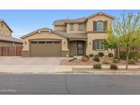 Charming two-story home featuring a two-car garage and appealing desert landscaping at 20493 E Thornton Rd, Queen Creek, AZ 85142