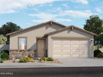 Charming single-story home featuring stone accents, a two-car garage, and a welcoming front entrance at 3513 E Audrey Dr, San Tan Valley, AZ 85143
