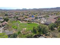 Aerial view of neighborhood park, with walking paths, lush greenery, and residential surroundings at 2411 W Oberlin Way, Phoenix, AZ 85085