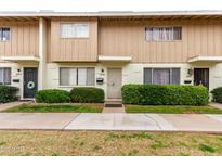 Charming townhomes featuring well-maintained landscaping, neutral paint, and a cozy, inviting facade at 5339 N Black Canyon Hwy, Phoenix, AZ 85015