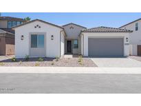 Charming single-story home with a well-maintained yard and a neutral color scheme at 40129 N Alameda Dr, San Tan Valley, AZ 85140