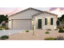 Charming single-story home featuring desert landscaping, a gray roof, and a two-car garage at 1746 S 246Th Ln, Buckeye, AZ 85326