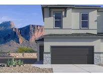 Beautiful home exterior showcasing modern design and stunning mountain views at 5850 E Ringtail Way, Phoenix, AZ 85054