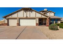 Charming single-Gathering home featuring a three car garage and a well-maintained front yard at 6012 W Sweetwater Ave, Glendale, AZ 85304