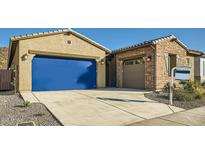 Charming single-story home featuring stucco and brick facade, two-car garage, and well-maintained landscaping at 3252 W Peak View Rd, Phoenix, AZ 85083