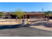 Charming single-story home with mountain views and low-maintenance desert landscaping at 8640 S 16Th Pl, Phoenix, AZ 85042