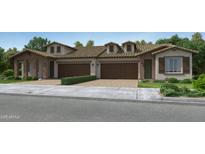 A charming attached villa featuring a private two-car garage and well-kept landscaping at 24973 N 174Th Ave, Surprise, AZ 85387