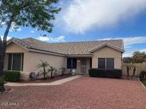 Charming single-story home with desert landscaping and a welcoming entrance at 3140 N 114Th Dr, Avondale, AZ 85392