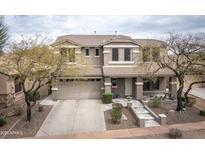 Beautiful two-story home with a well-manicured front yard and charming curb appeal at 35317 N 31St Dr, Phoenix, AZ 85086