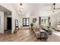 Bright living room featuring modern decor, stylish seating, and ample natural light at 9515 N 47Th St, Phoenix, AZ 85028