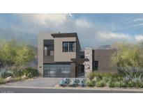 Striking two-story modern home with a spacious garage, stone accents, and beautiful desert landscaping at 18559 N 92Nd Pl, Scottsdale, AZ 85255