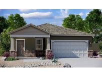 Charming single-story home featuring a two-car garage and covered entry at 15660 W Deanne Dr, Waddell, AZ 85355