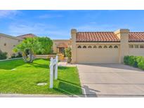Charming single-Gathering home with tile roof, well-maintained landscaping, and attached two-car garage at 5505 E Mclellan Rd # 41, Mesa, AZ 85205