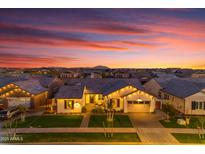 Beautiful single-story home in a suburban community featuring desert landscaping and a colorful twilight sky at 3547 E Bloomfield Pkwy, Gilbert, AZ 85296