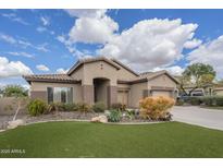 Beautiful single-story home featuring a well-manicured lawn and desert landscaping at 1154 E Kramer Cir, Mesa, AZ 85203