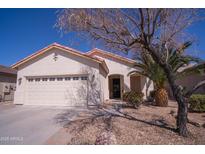 Charming single-story home with a well-maintained yard and attached two-car garage at 22520 W Moonlight Path, Buckeye, AZ 85326