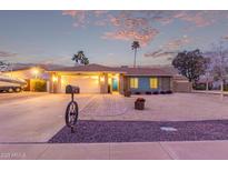 Charming single-story home with a manicured front yard, two-car garage, and inviting entryway at 2248 W Mandalay Ln, Phoenix, AZ 85023