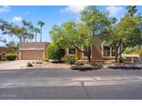 Charming home with a two-car garage and desert landscaping in a vibrant, sunny neighborhood at 25515 N Forest N Rd # 2, Rio Verde, AZ 85263