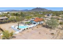 Beautiful desert home with a fenced pool and patio area perfect for outdoor entertainment at 33810 N Smokehouse Trl, Cave Creek, AZ 85331
