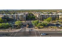 Stunning aerial view of the community featuring lush landscaping and well-maintained buildings at 5450 E Deer Valley Dr # 3008, Phoenix, AZ 85054