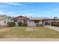 Charming single-story home with a well-maintained front yard and mature landscaping at 1324 W 15Th St, Tempe, AZ 85281