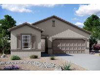 Charming single-story home with neutral stucco, shutters, manicured landscaping, and a two-car garage at 15649 W Deanne Dr, Waddell, AZ 85355