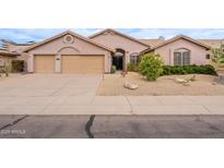 Charming single-story home features desert landscaping and a two-car garage at 9126 E Topeka Dr, Scottsdale, AZ 85255