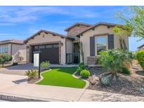 Charming single-story home featuring an attached two-car garage and well-maintained landscaping at 93 E Santa Lucia Ln, Queen Creek, AZ 85140