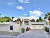 Charming single-story home featuring a private gated entrance, attached two car garage and well maintained desert landscaping at 6841 N 3Rd Pl, Phoenix, AZ 85012