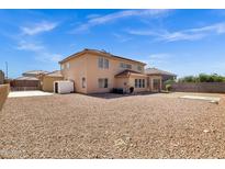 Large backyard with low maintenance stone landscaping, shed and mature trees at 10520 W Patrick Ln, Peoria, AZ 85383