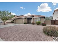 Charming single-story home features a well-maintained yard and a classic Southwestern design at 9176 N 82Nd Ln, Peoria, AZ 85345