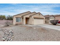 Charming single-story home with a low maintenance yard and neutral color palette at 15984 W Watkins St, Goodyear, AZ 85338